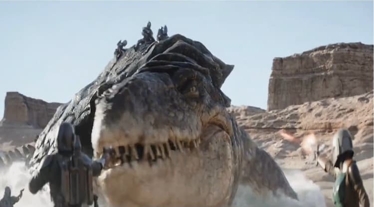 A group of Mandalorians are fighting a giant creature that resembles a prehistoric dinosaur.