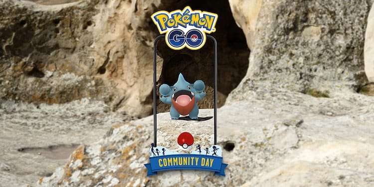 Pokemon GO blog post photo reading: “Pokemon GO Community Day” A Gible happily roars outside of a craggy rock outcrop.