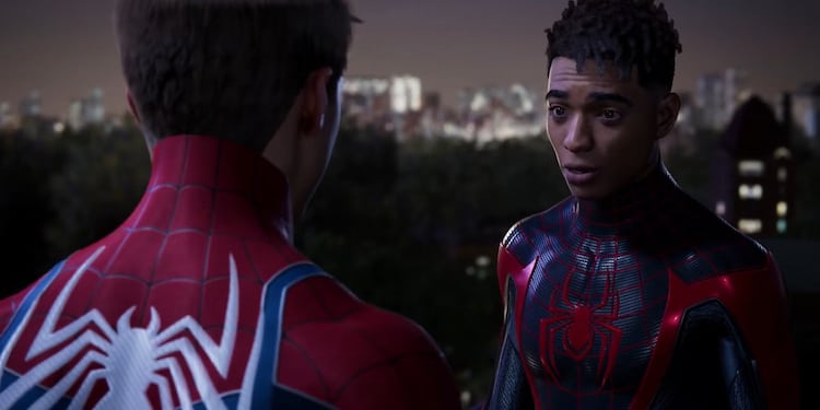 Two Spider-men talk on a rooftop over a park