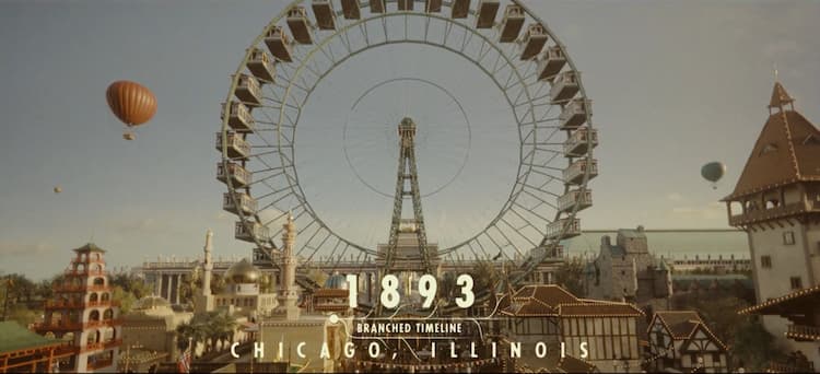 The Chicago World’s Fair. A giant Ferris Wheel is in the centre with building and stalls around it. Hot air balloons are in the sky above the area