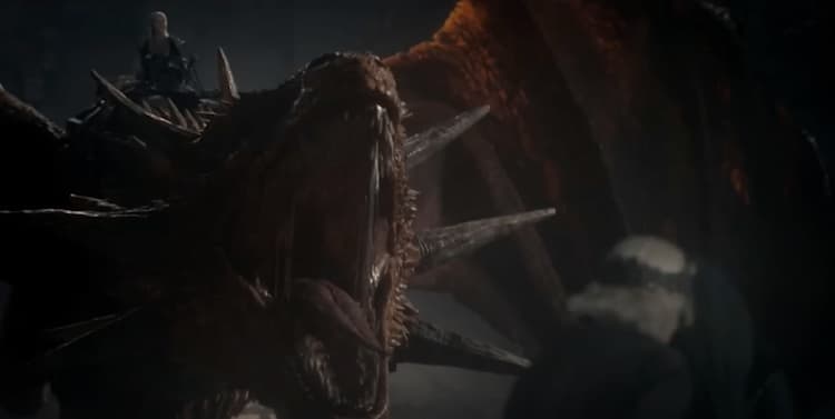 Rhaenys Targaryen's dragon Meleys roars at Aegon II on his coronation day.