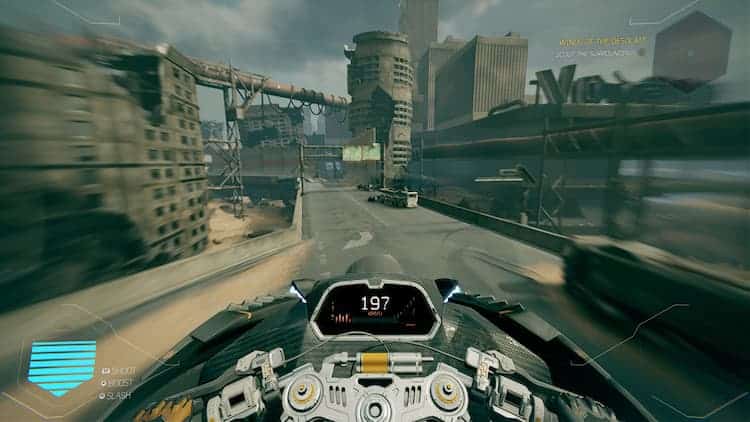 The speedometer of a motorcycle is in the centre of the screen. To the left is a blue boost gauge. They are driving on a freeway with abandoned buildings all around the screen. Everything is covered in sand.