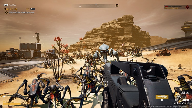 A desert field full of multilegged insect-like monsters.