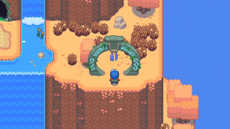 The player activates a shrine, making the arch glow a deep cyan blue.