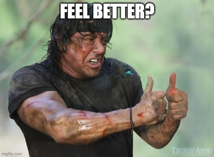 A bruised and bloody Rambo puts his thumbs up in agreement. The words “Feel Better?” are displayed at the top of the picture